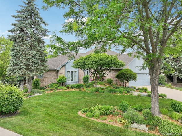 2138 Kennedy Dr, Rochester Hills, MI 48309 - view of front of home featuring a front lawn, driveway, a garage, brick siding, and roof with shingles