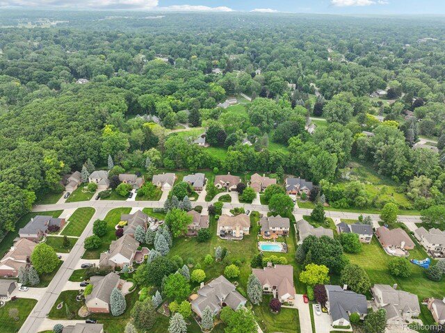 2138 Kennedy Dr, Rochester Hills, MI 48309 - aerial perspective of suburban area with a forest