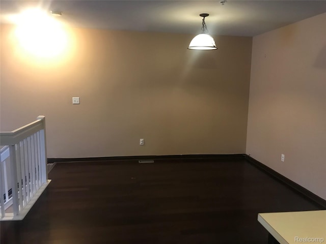 13635 Osborn Ave Unit 126, Dearborn, MI 48126 - spare room featuring dark wood-type flooring