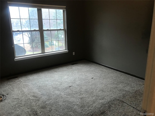 13635 Osborn Ave Unit 126, Dearborn, MI 48126 - carpeted empty room with baseboards