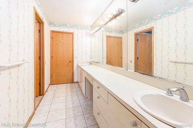 5322 Pond Bluff Dr, West Bloomfield, MI 48323 - bathroom with double vanity, wallpapered walls, tile patterned flooring, and a closet