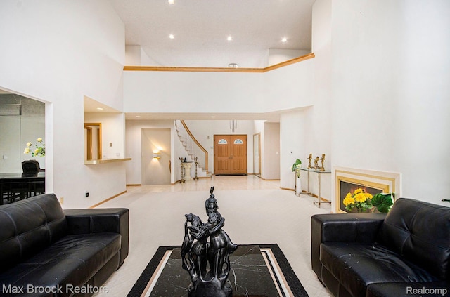 5322 Pond Bluff Dr, West Bloomfield, MI 48323 - living area with a high ceiling, stairway, recessed lighting, and carpet