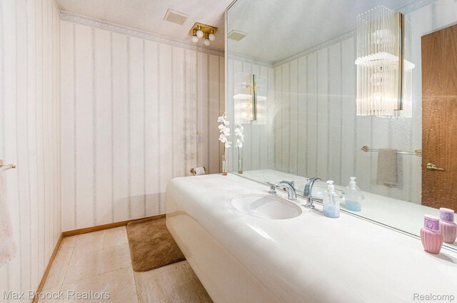 5322 Pond Bluff Dr, West Bloomfield, MI 48323 - bathroom with tile patterned flooring and vanity