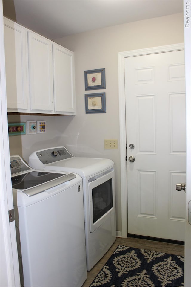 14361 Blue Heron Dr, Fenton, MI 48430 - laundry room featuring washing machine and clothes dryer and cabinet space