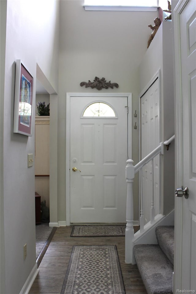 14361 Blue Heron Dr, Fenton, MI 48430 - foyer entrance with wood finished floors and a high ceiling