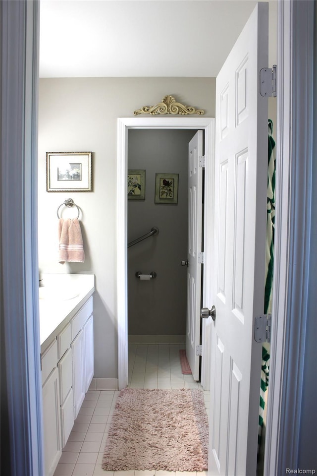 14361 Blue Heron Dr, Fenton, MI 48430 - bathroom featuring tile patterned floors and vanity