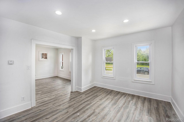 2934 Virginia Park St, Livonia, MI 48206 - spare room with wood finished floors and recessed lighting