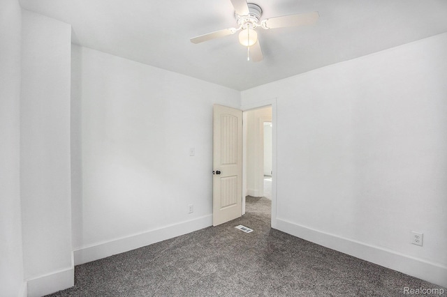 2934 Virginia Park St, Livonia, MI 48206 - carpeted empty room with baseboards and ceiling fan