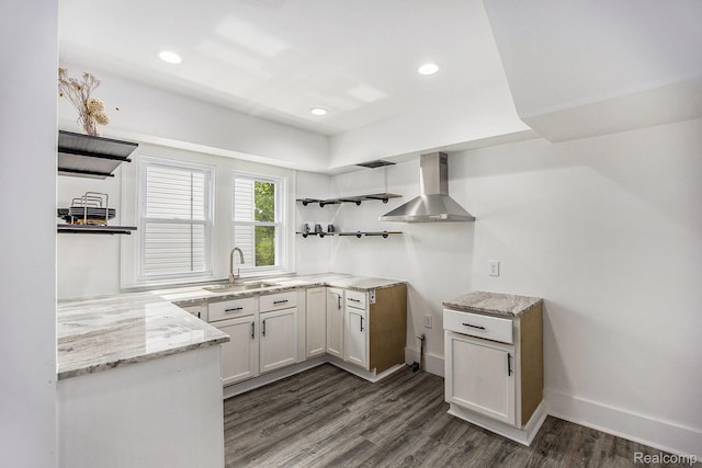 2934 Virginia Park St, Livonia, MI 48206 - kitchen with wall chimney range hood, light stone counters, dark wood-style floors, white cabinets, and recessed lighting
