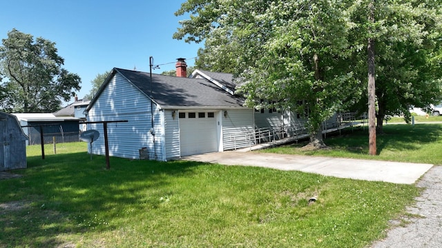11469 Haven St, Clio, MI 48420 - view of side of property featuring driveway, a chimney, a shingled roof, and a garage