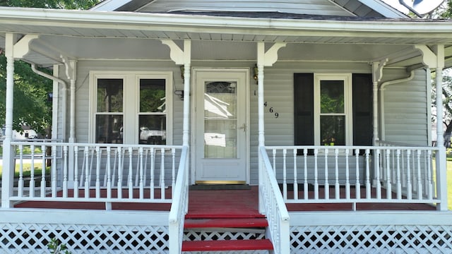11469 Haven St, Clio, MI 48420 - doorway to property featuring a porch
