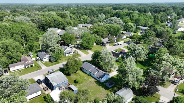 11469 Haven St, Clio, MI 48420 - aerial view of property and surrounding area with a heavily wooded area and nearby suburban area