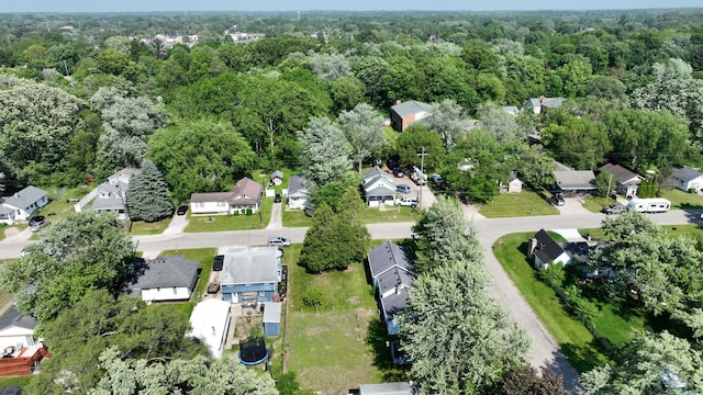 11469 Haven St, Clio, MI 48420 - aerial view of property and surrounding area featuring a heavily wooded area