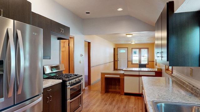 11469 Haven St, Clio, MI 48420 - kitchen featuring appliances with stainless steel finishes, light countertops, light wood-type flooring, dark brown cabinetry, and recessed lighting