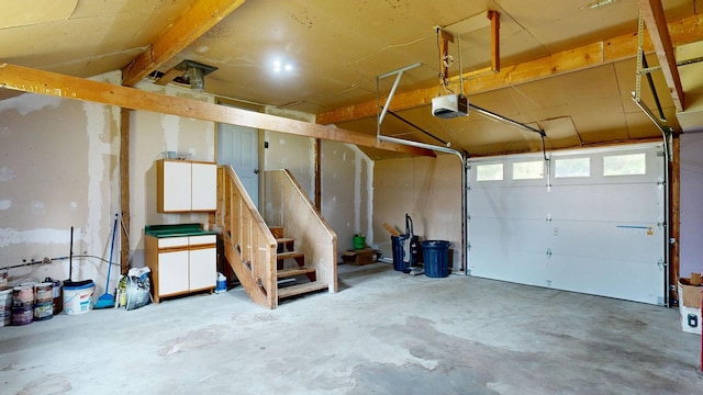 11469 Haven St, Clio, MI 48420 - garage featuring a garage door opener