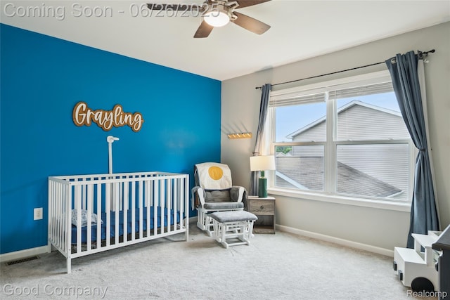 1123 Tartan Ln, Walled Lake, MI 48390 - carpeted bedroom featuring a nursery area and ceiling fan