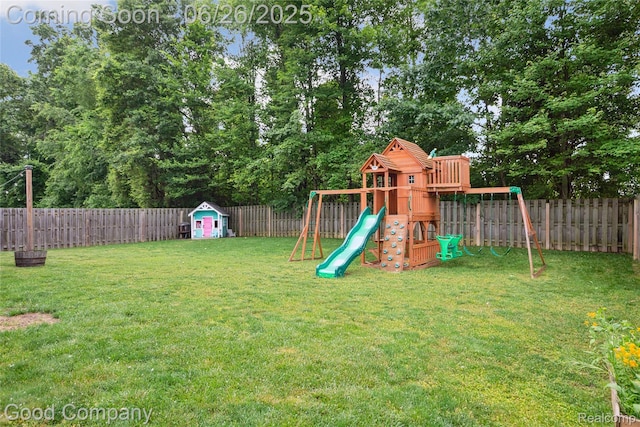 1123 Tartan Ln, Walled Lake, MI 48390 - fenced backyard with a playground