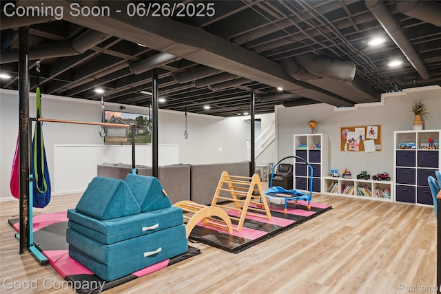 1123 Tartan Ln, Walled Lake, MI 48390 - finished basement with wood finished floors