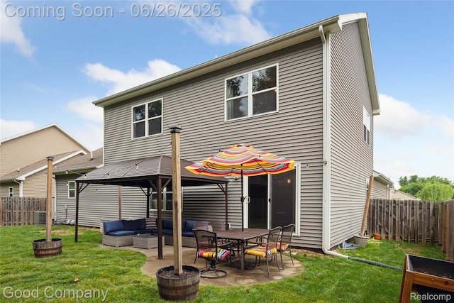 1123 Tartan Ln, Walled Lake, MI 48390 - rear view of property featuring an outdoor living space, a fenced backyard, a patio area, and a gazebo