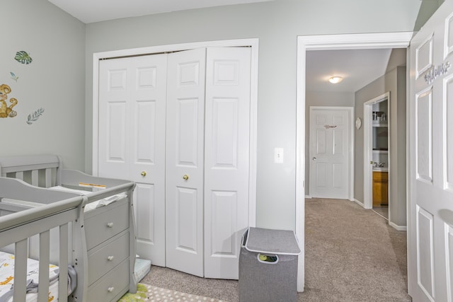4315 Knollcrest Dr, Ann Arbor, MI 48108 - bedroom with a closet, light carpet, and a nursery area