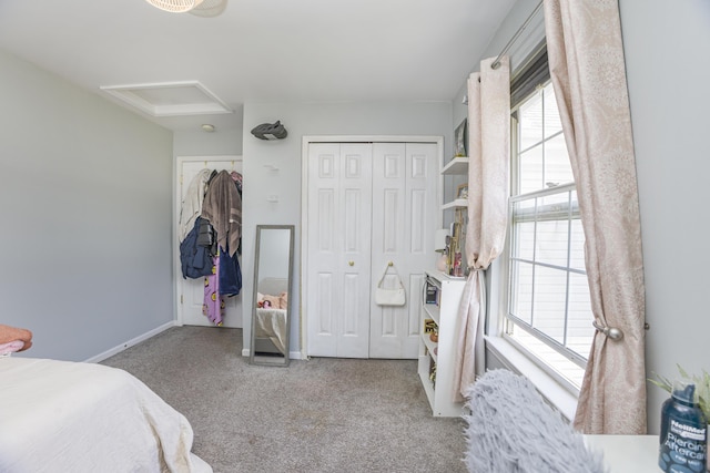 4315 Knollcrest Dr, Ann Arbor, MI 48108 - carpeted bedroom featuring baseboards and attic access