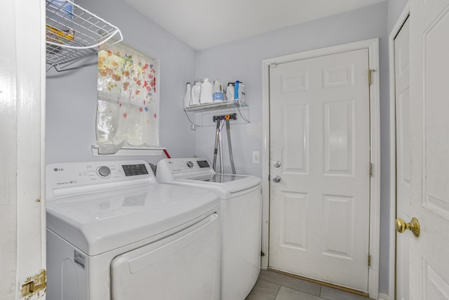 4315 Knollcrest Dr, Ann Arbor, MI 48108 - washroom featuring washer and clothes dryer and light tile patterned floors