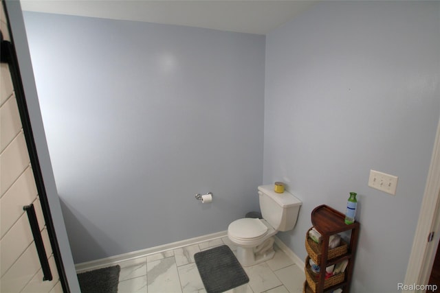 12850 E Rd, Burt, MI 48417 - half bath featuring toilet and marble finish floors