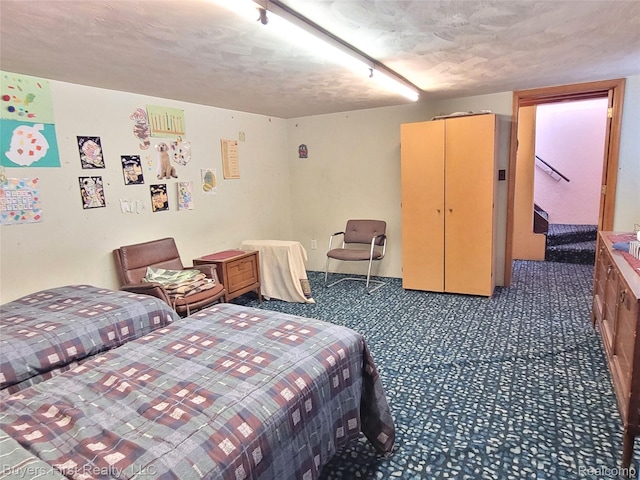 26001 Harding Sq, Oak Park, MI 48237 - bedroom featuring carpet and a textured ceiling