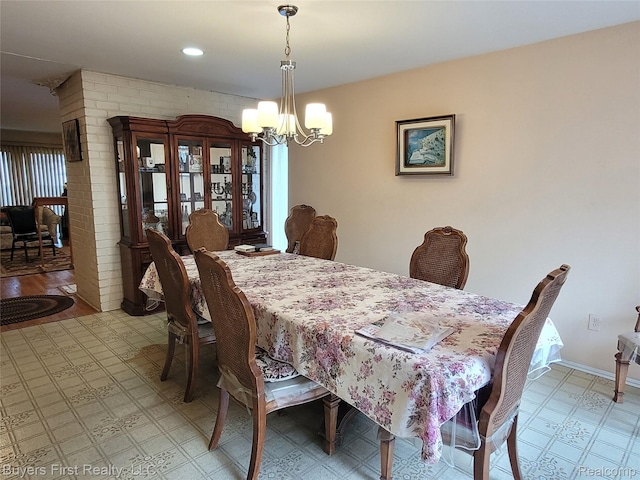 26001 Harding Sq, Oak Park, MI 48237 - dining area with light floors and a chandelier