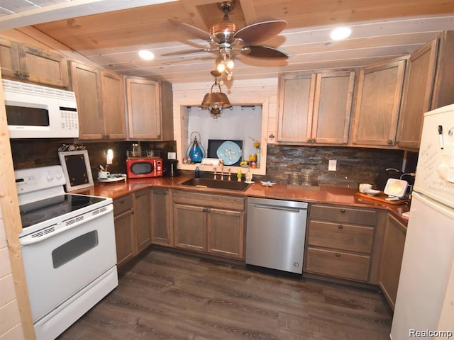 13358 Wendell St, Fenton, MI 48430 - kitchen featuring white appliances, decorative backsplash, dark wood-style flooring, ceiling fan, and recessed lighting