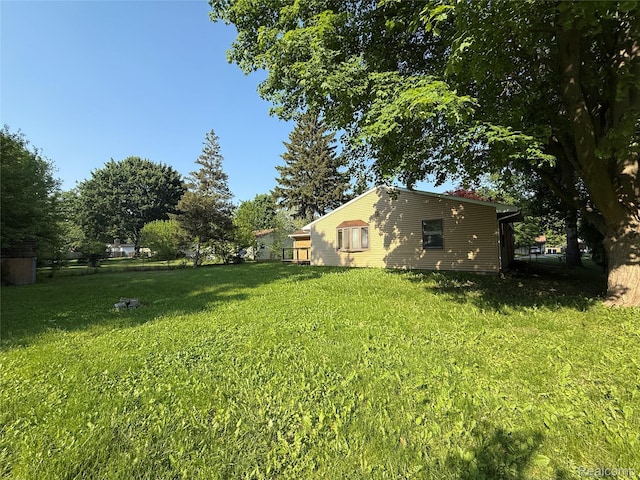 1321 Rainbow Dr, Saginaw, MI 48638 - view of green lawn