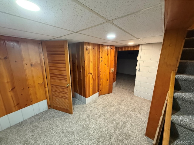 1321 Rainbow Dr, Saginaw, MI 48638 - finished below grade area featuring carpet floors, a paneled ceiling, stairs, recessed lighting, and wood walls