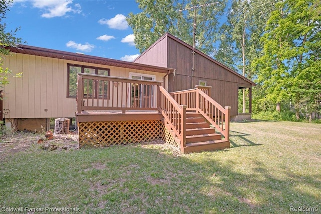 210 Mary St, Flushing, MI 48433 - rear view of property with a lawn and a deck