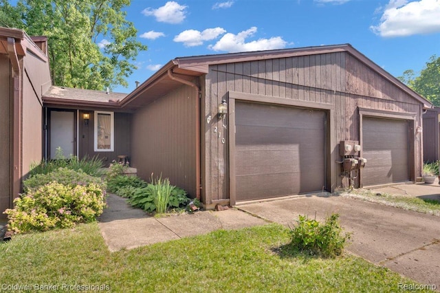 210 Mary St, Flushing, MI 48433 - ranch-style house with a garage