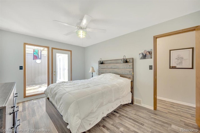 210 Mary St, Flushing, MI 48433 - bedroom with light wood finished floors and a ceiling fan