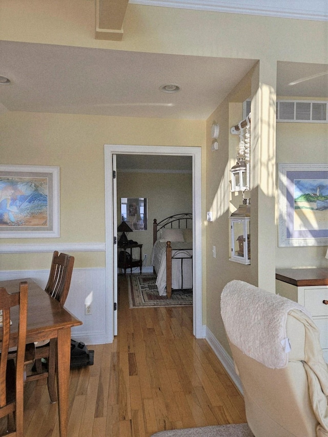 1005 W Lake St, Tawas City, MI 48763 - dining space with light wood-style floors and baseboards