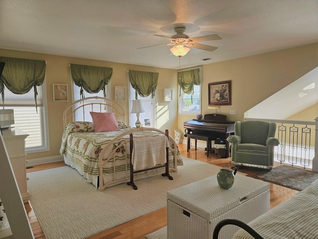 1005 W Lake St, Tawas City, MI 48763 - bedroom featuring wood finished floors