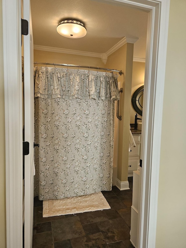 1005 W Lake St, Tawas City, MI 48763 - full bath with crown molding, a shower with curtain, and stone finish floors