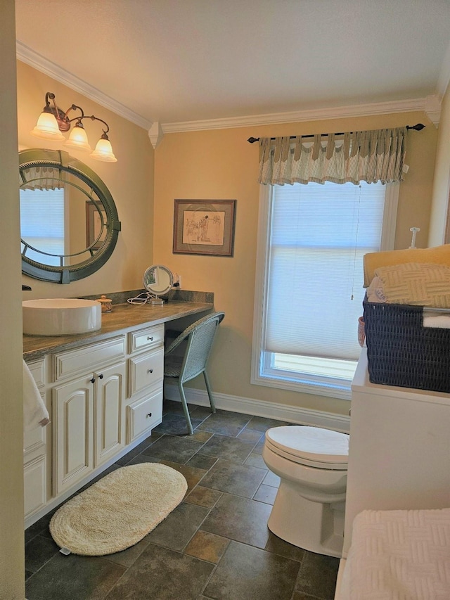 1005 W Lake St, Tawas City, MI 48763 - bathroom featuring crown molding, stone tile flooring, and vanity