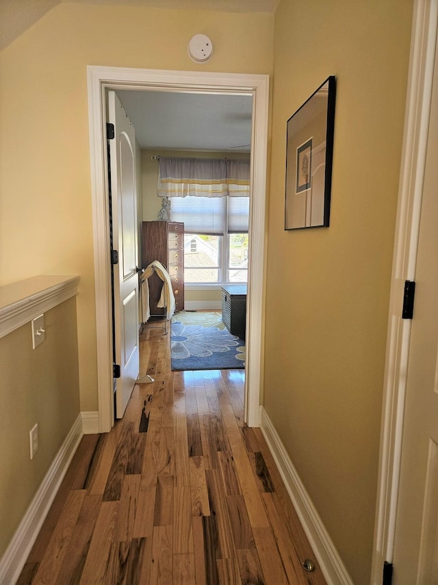 1005 W Lake St, Tawas City, MI 48763 - hall featuring wood finished floors and baseboards