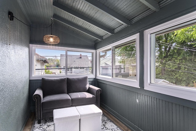 643 Giddings Ave SE, Grand Rapids, MI 49506 - sunroom featuring wood finished floors and a textured wall