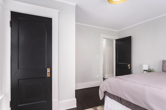 643 Giddings Ave SE, Grand Rapids, MI 49506 - bedroom with wood finished floors and ornamental molding