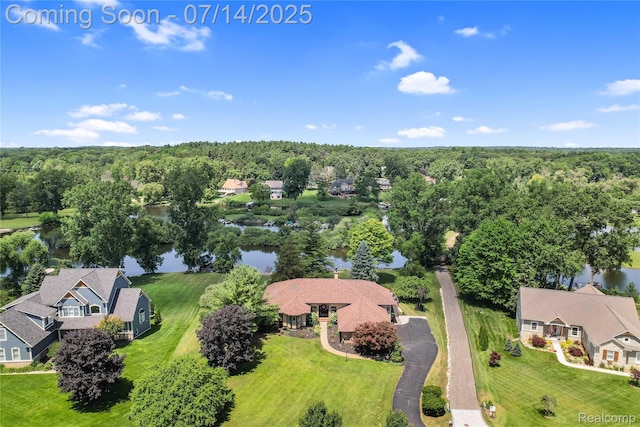 2985 Dana Pointe Dr, Pinckney, MI 48169 - view of subject property with a nearby body of water and a heavily wooded area