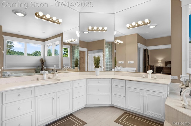 2985 Dana Pointe Dr, Pinckney, MI 48169 - bathroom featuring double vanity and connected bathroom
