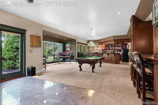 2985 Dana Pointe Dr, Pinckney, MI 48169 - playroom with plenty of natural light, billiards, a dry bar, and light marble finish flooring
