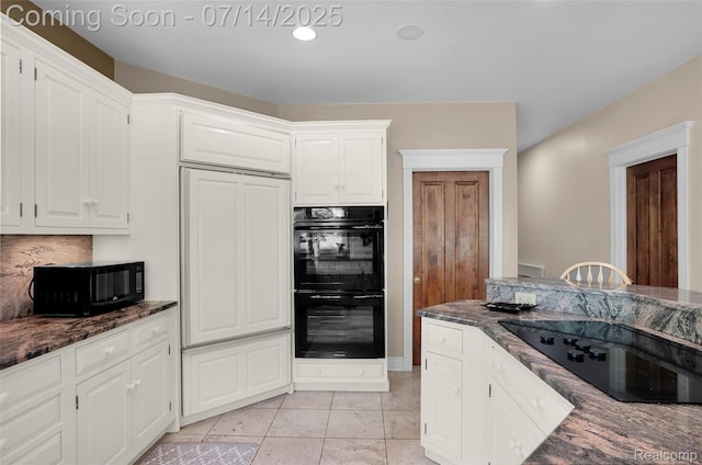 2985 Dana Pointe Dr, Pinckney, MI 48169 - kitchen with black appliances, dark stone countertops, white cabinetry, recessed lighting, and light tile patterned flooring
