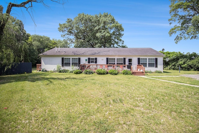 2256 Moulder Dr, Niles, MI 49120 - ranch-style home featuring a wooden deck and a front yard