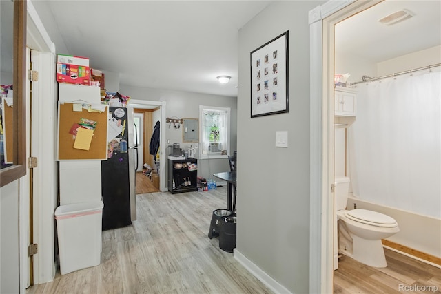 1896 Spaulding Rd, Monroe, MI 48162 - corridor with wood finished floors and electric panel