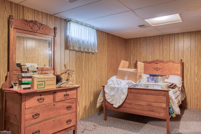 538 Dimmick St, Owosso, MI 48867 - bedroom with wooden walls and carpet floors
