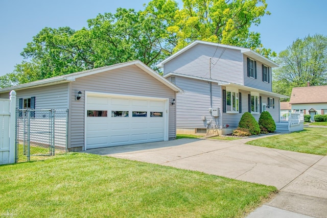 538 Dimmick St, Owosso, MI 48867 - view of front facade with a detached garage and an outbuilding